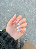 Glazed White French premier gel press on nails close up, high-gloss glazed finish