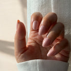 Dusty rose pink soft acrylic press-on nails close-up, natural short oval set Australia