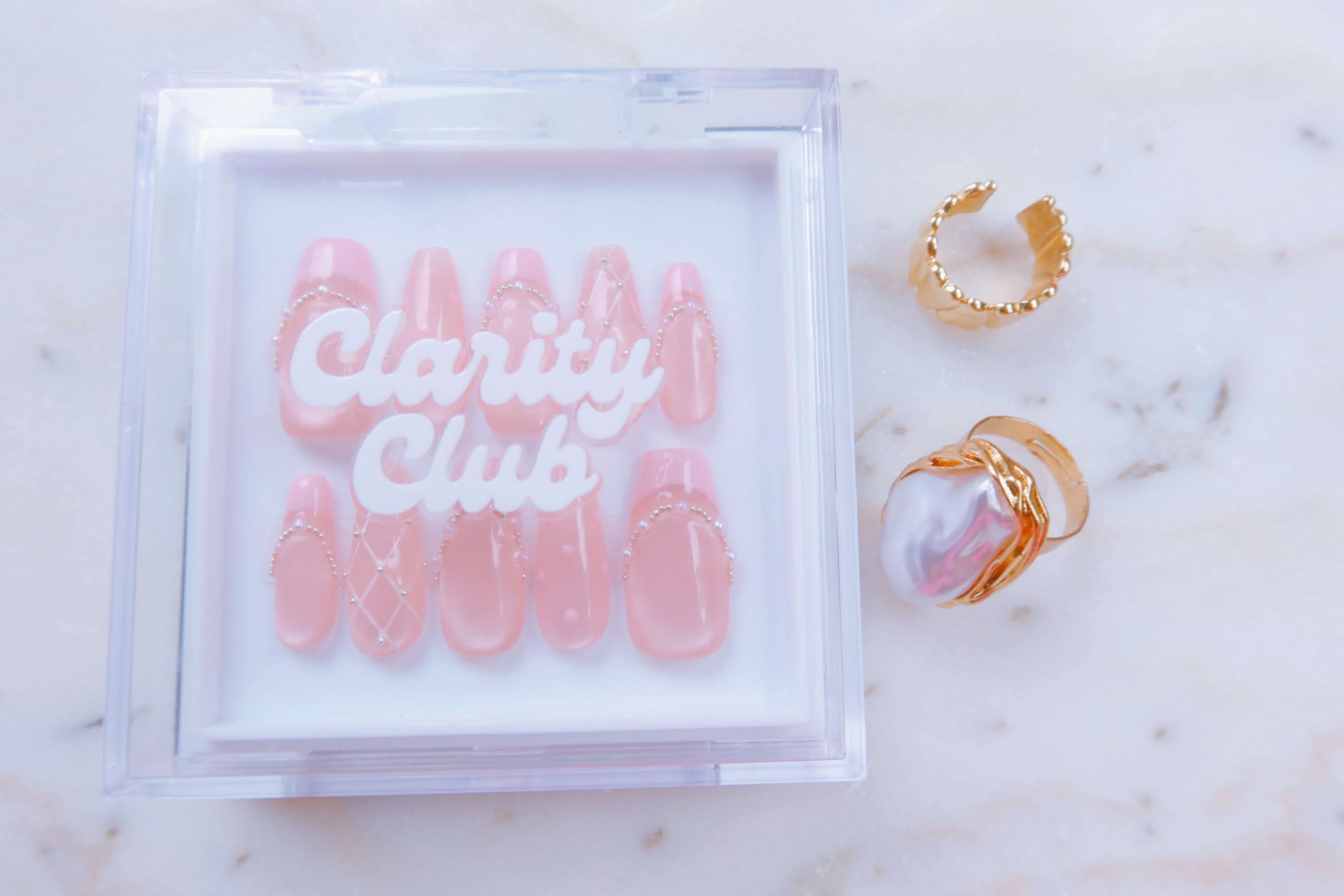 handcrafted blush pink cat-eye press on nails with polka dot pearl embellishment lattice design pink french