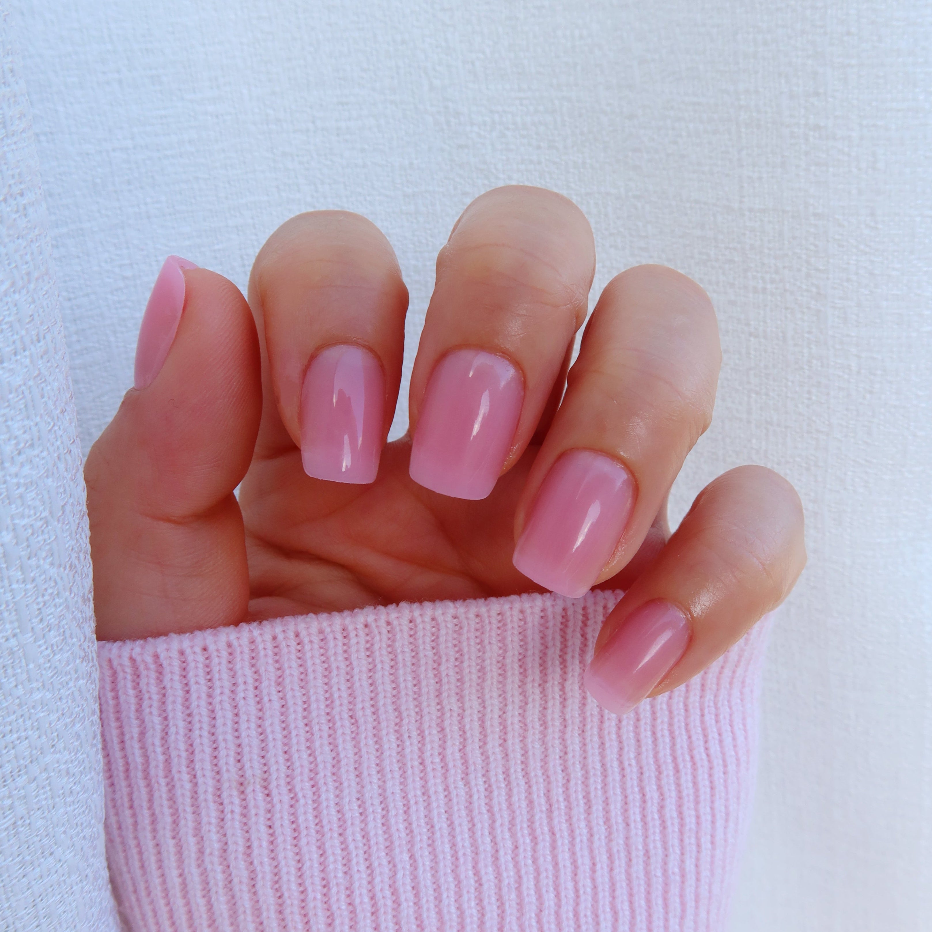     Glossy natural pink soft gel nails with healthy nail look