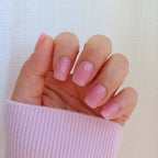     Soft translucent pink press-on nails with lip gloss shine effect