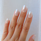     Pearl chrome press-on nails in soft milky white clean girl manicure style